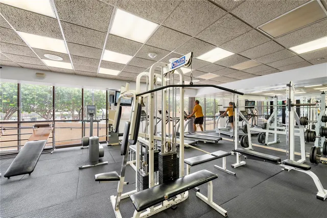 a view of swimming pool with a lounge chair