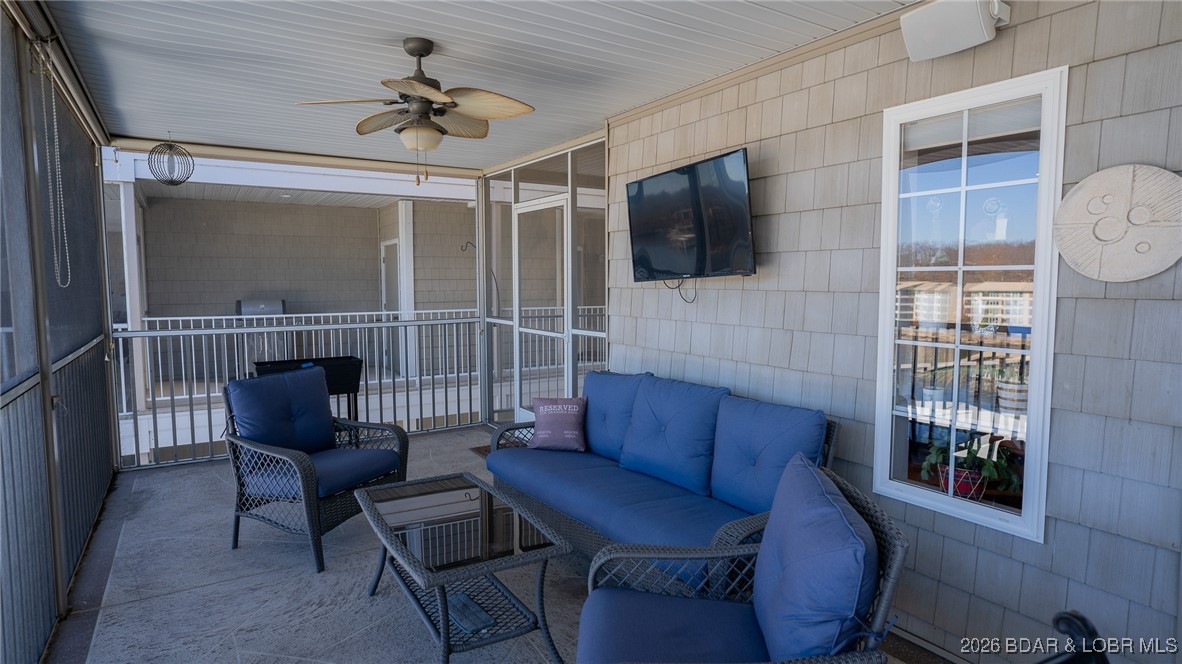 68 Lighthouse Road, Unit 511 Lake Ozark, MO 65049 - Photo 43 of 56 Screened-in Lakefront deck