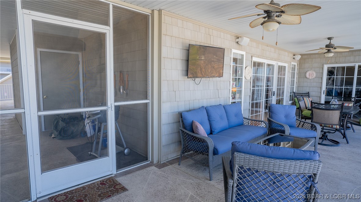 68 Lighthouse Road, Unit 511 Lake Ozark, MO 65049 - Photo 44 of 56 Screened-in Lakefront deck