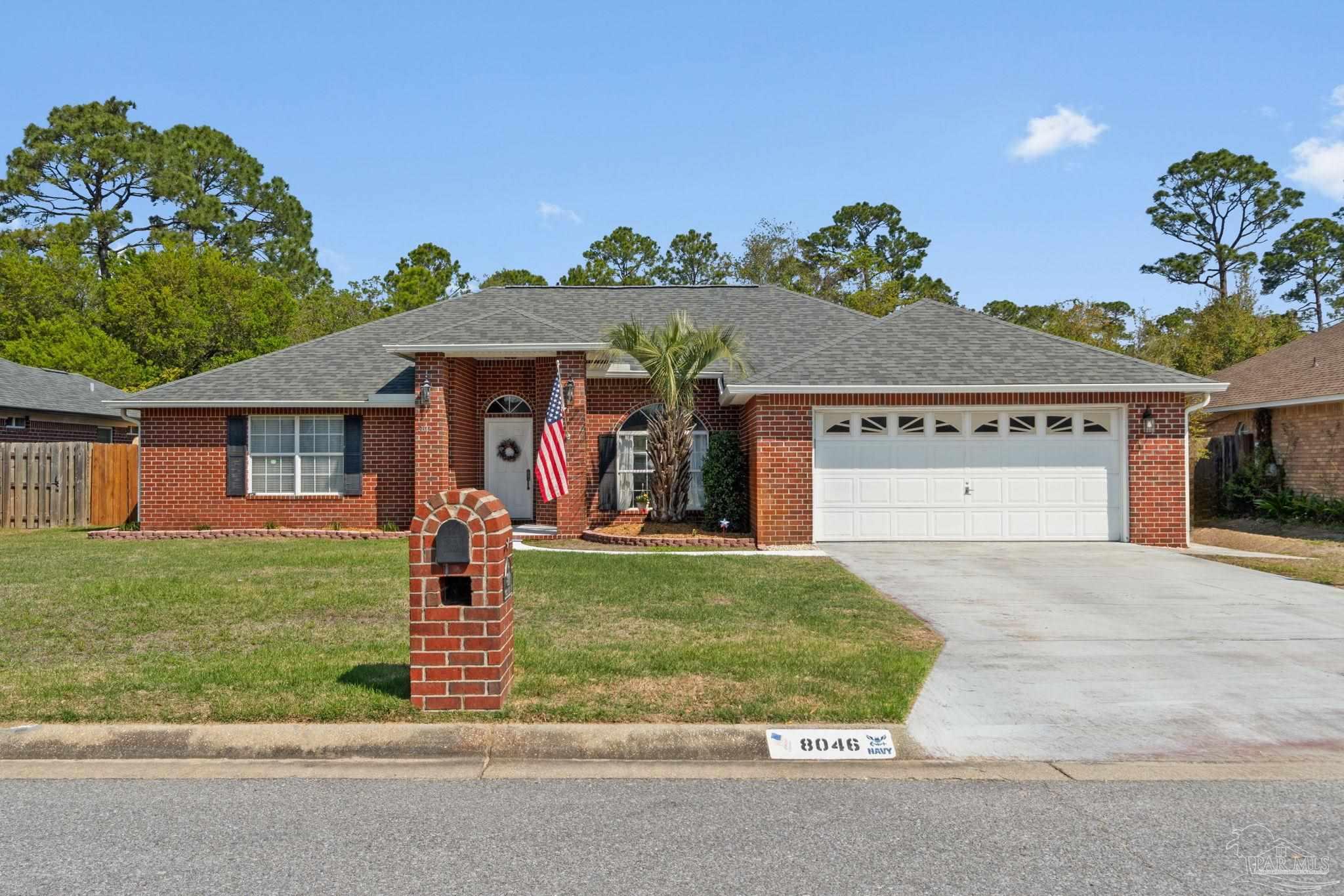 8046 Castle Pointe Way Pensacola, FL 32506 - Photo 1 of 40 front view of a house with a yard