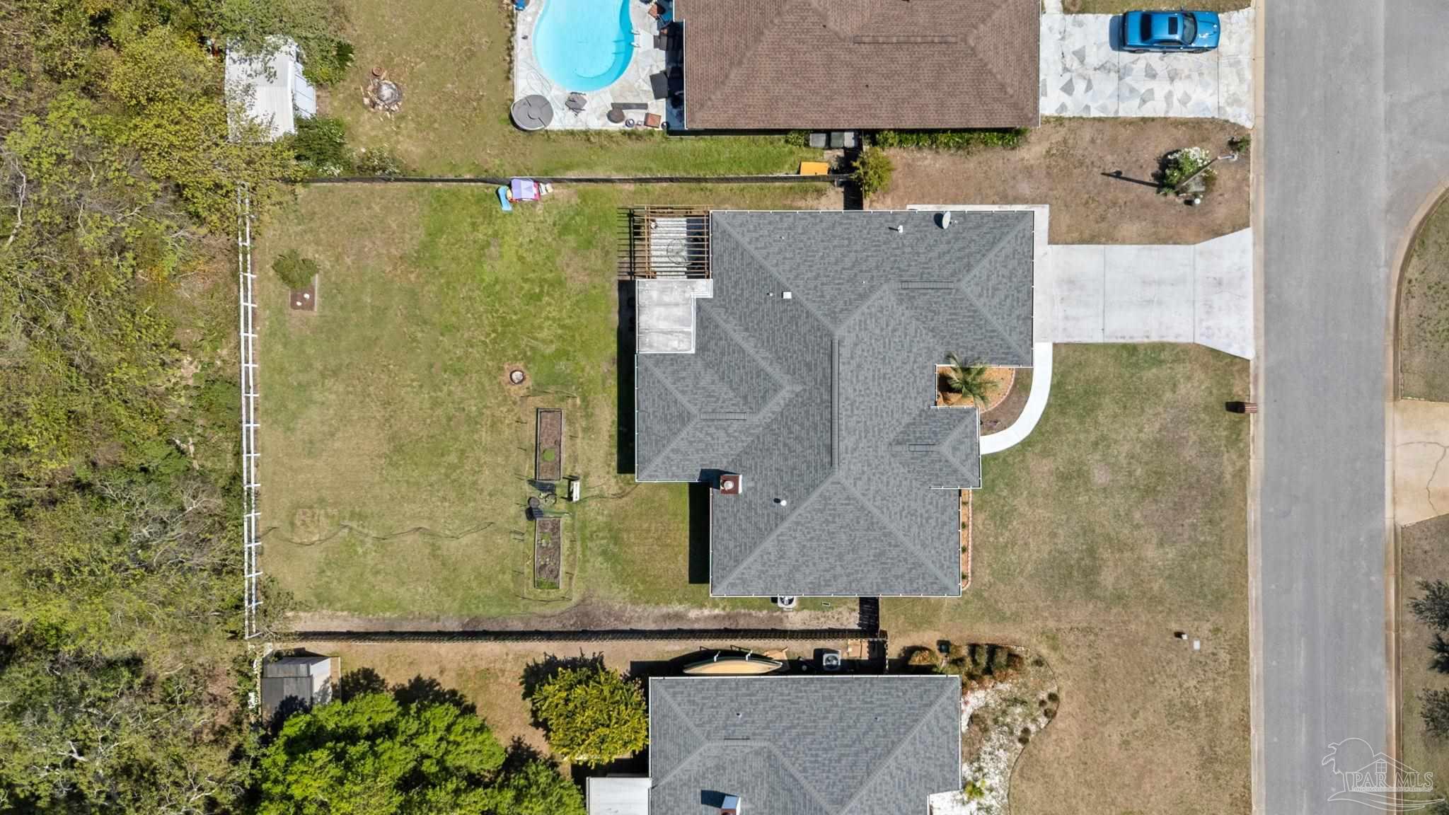 8046 Castle Pointe Way Pensacola, FL 32506 - Photo 32 of 40 an aerial view of residential houses with outdoor space
