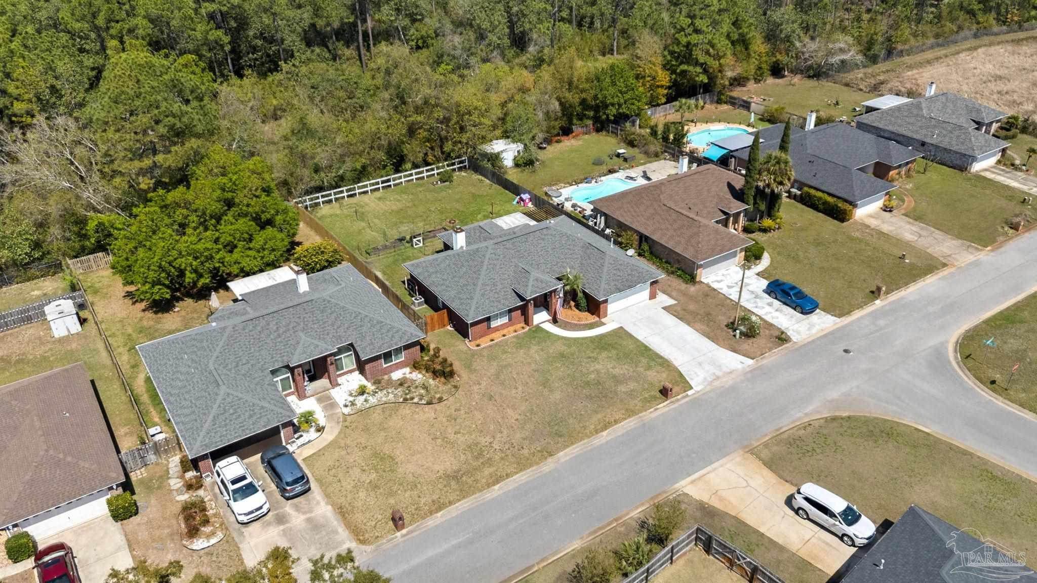 8046 Castle Pointe Way Pensacola, FL 32506 - Photo 33 of 40 an aerial view of a house with outdoor space