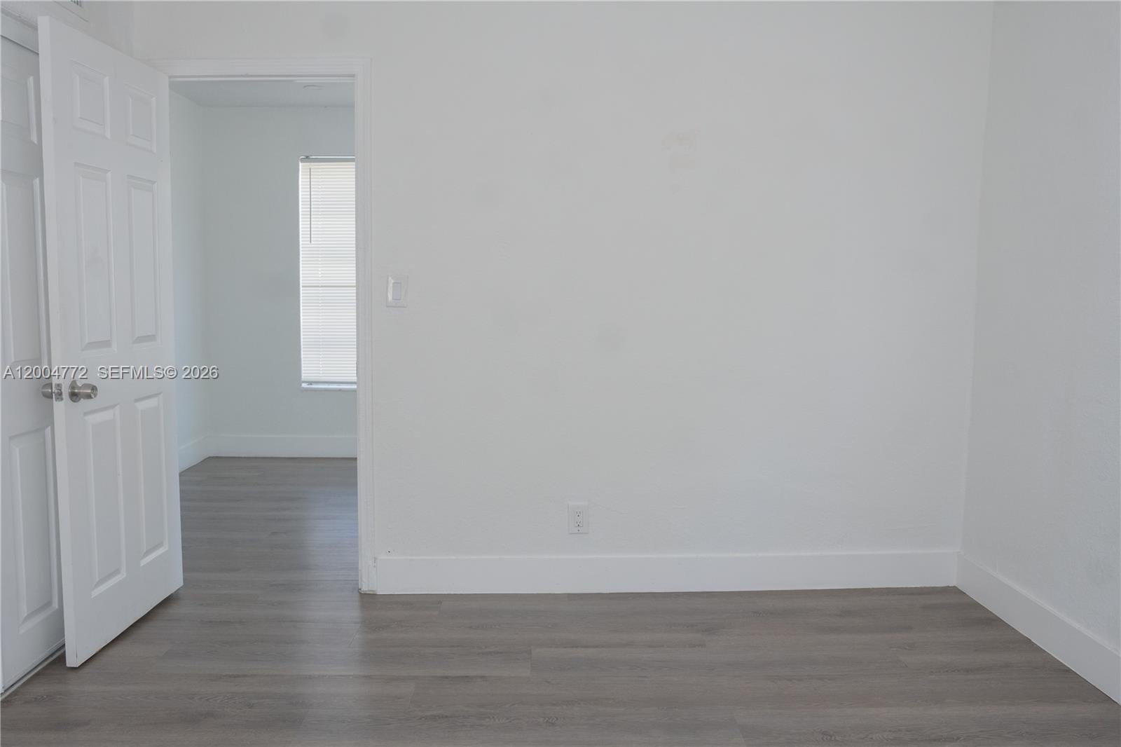 3376 Northwest 49th Street Miami, FL 33142 - Photo 7 of 17 a view of an empty room