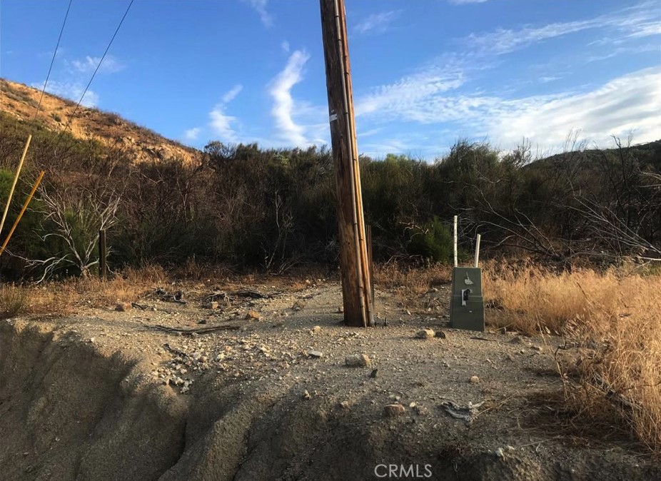 0 Gully View Drive Anza, CA 92539 - Photo 3 of 9 a view of a yard with wooden fence