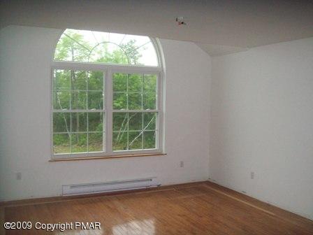 1815 Clover Road South Long Pond, PA 18334 - Photo 5 of 7 an empty room with a window