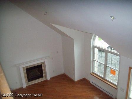 1815 Clover Road South Long Pond, PA 18334 - Photo 7 of 7 a view of an empty room and window