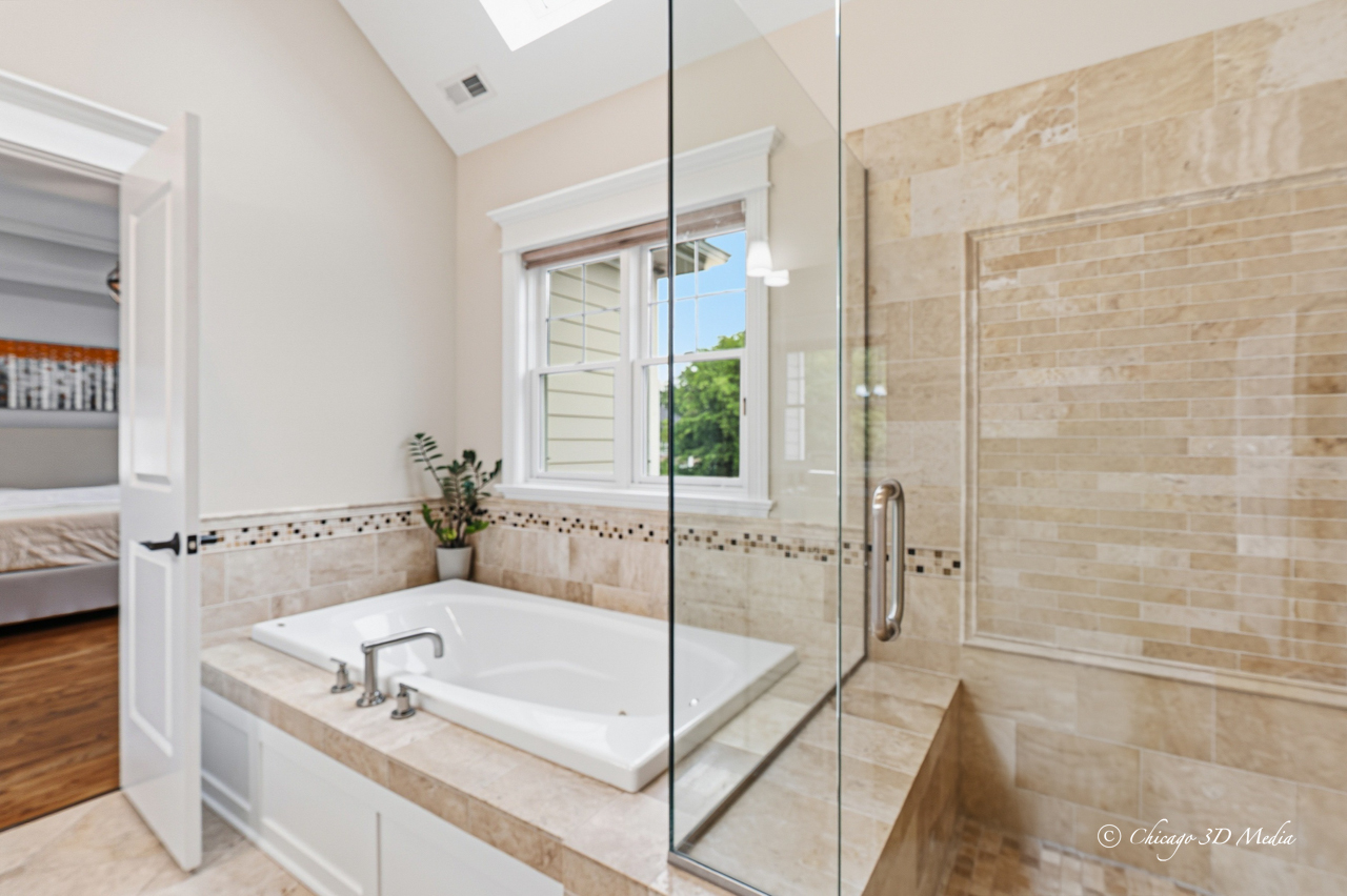 306 17th Street Wilmette, IL 60091 - Photo 26 of 48 a bathroom with a tub a sink and a shower