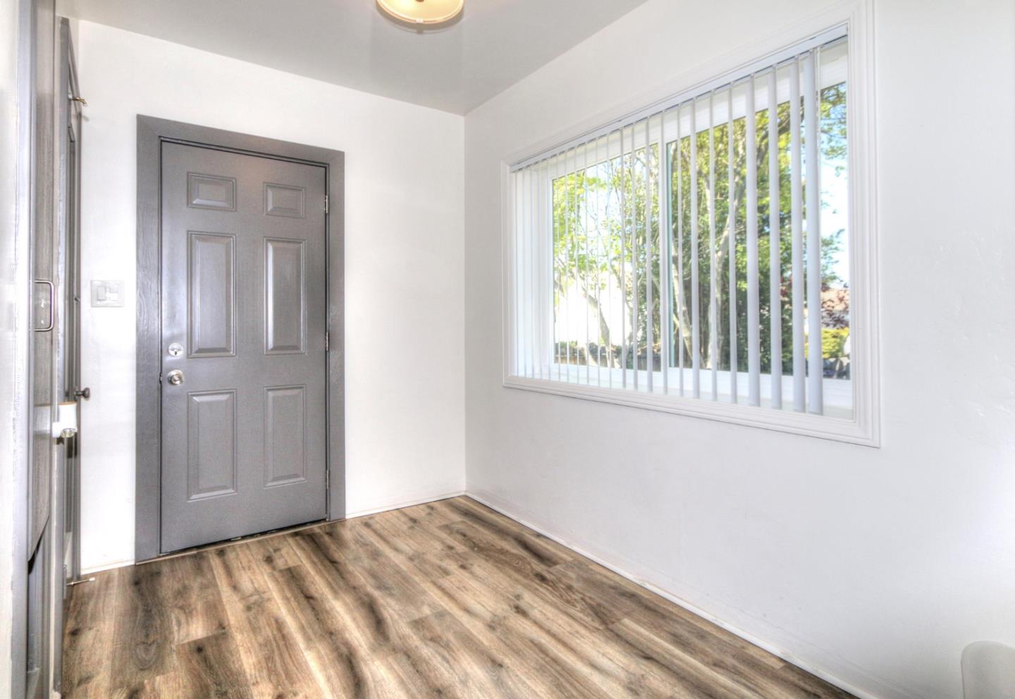 553 Rutland Avenue San Jose, CA 95128 - Photo 10 of 20 a view of an empty room with a window