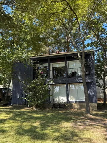 a view of a house with a swimming pool