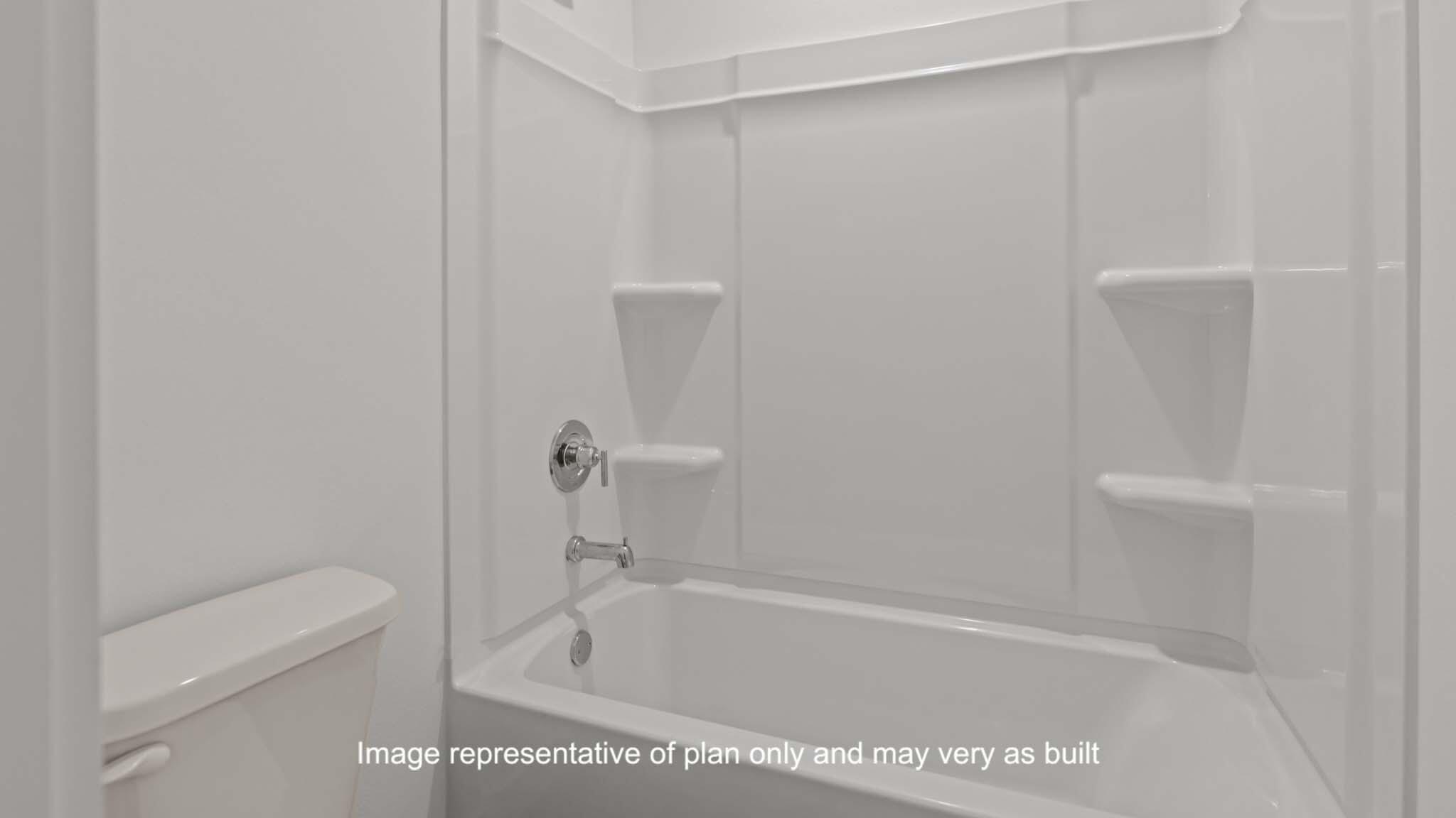617 East 15th Street Wolfforth, TX 79382 - Photo 27 of 33 a bath tub sitting next to a white toilet