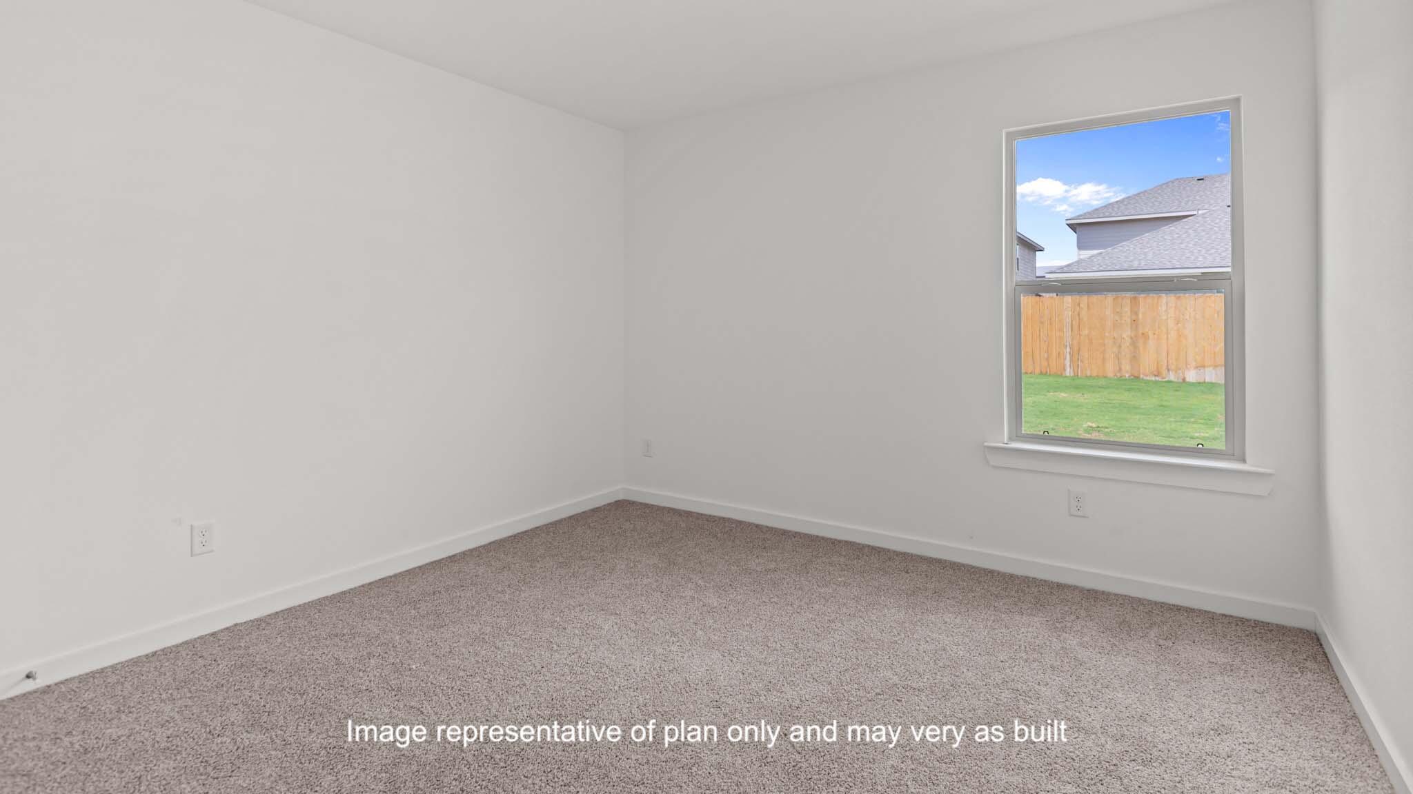 617 East 15th Street Wolfforth, TX 79382 - Photo 10 of 33 an empty room with a window and a mirror