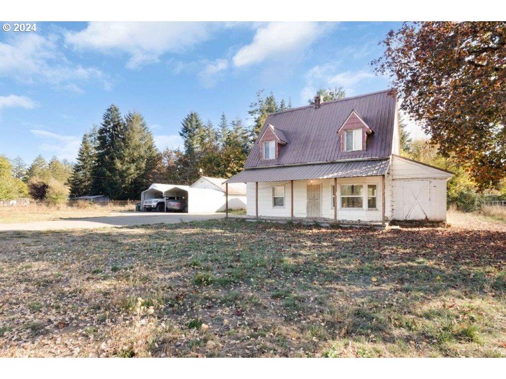 281 Dancer Road Camas Valley, OR 97416 - Photo 10 of 48 a view of a house with a yard
