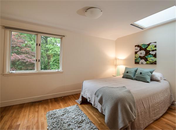 15 Oakvale Road Newton, MA 02468 - Photo 11 of 23 a bedroom with a bed and a window