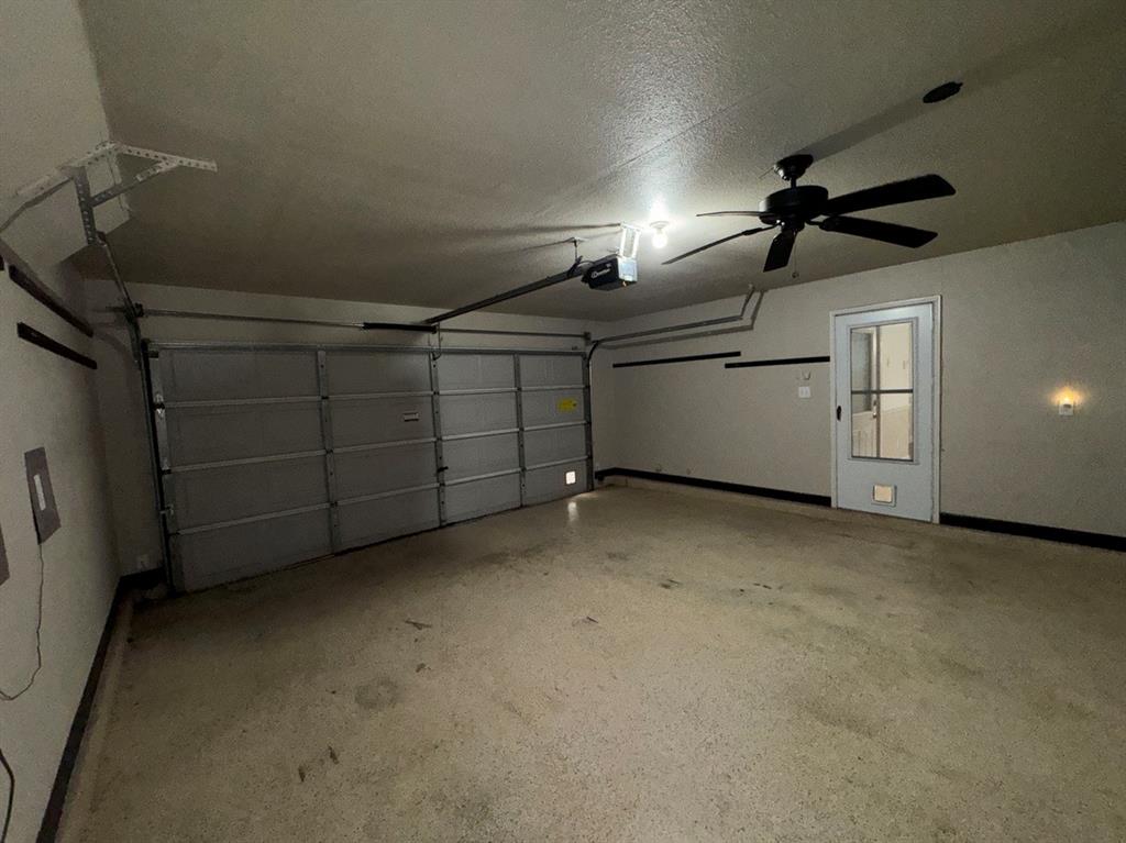 2024 Brazos Court Grand Prairie, TX 75052 - Photo 21 of 40 a view of a garage