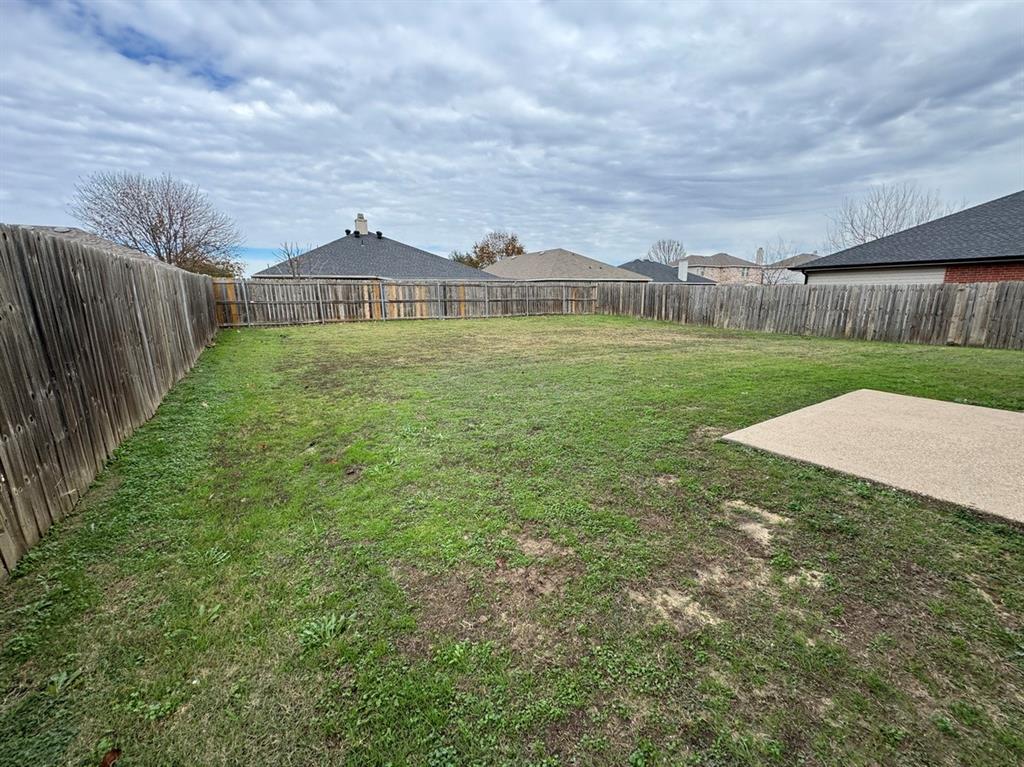2024 Brazos Court Grand Prairie, TX 75052 - Photo 4 of 40 a view of a house with a yard