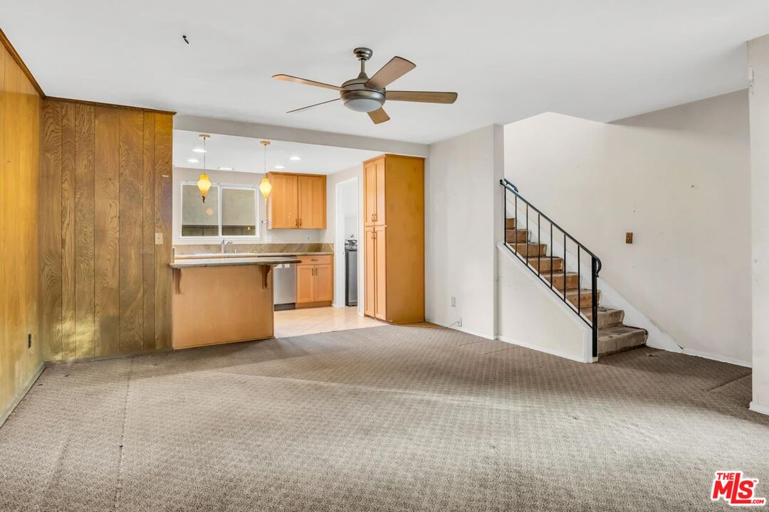 11258 Yolanda Avenue Porter Ranch, CA 91326 - Photo 14 of 46 a view of an empty room with window and kitchen view