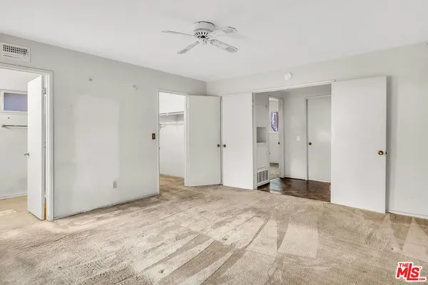 a view of a room with an empty space