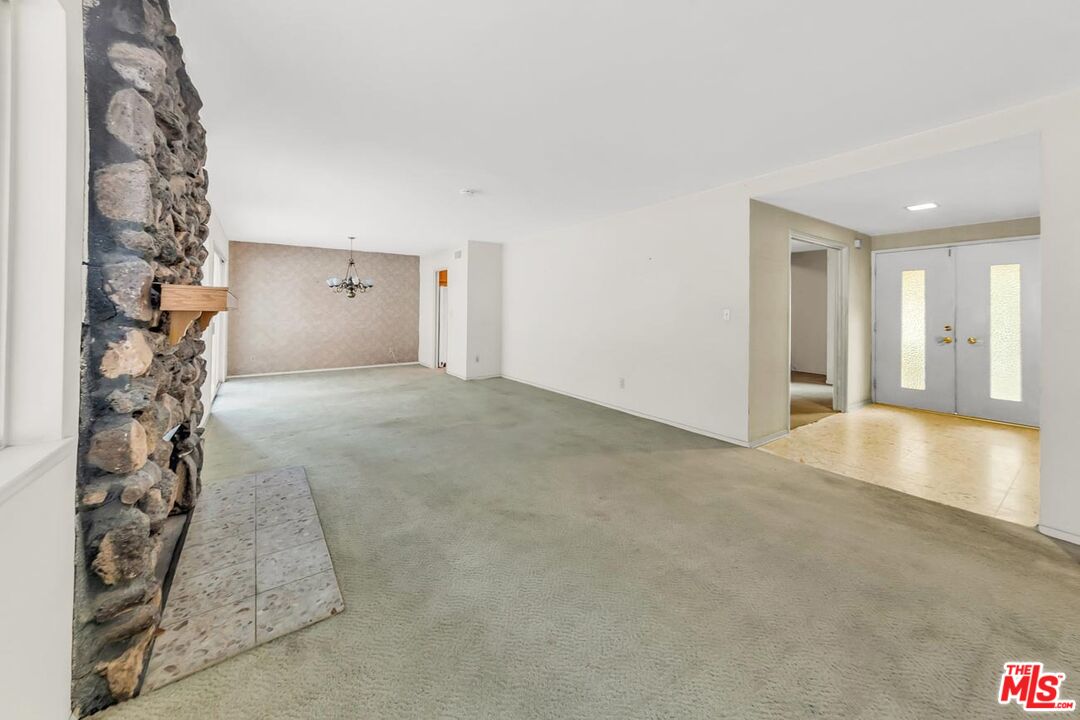 11258 Yolanda Avenue Porter Ranch, CA 91326 - Photo 28 of 46 a view of a big room with closet and windows