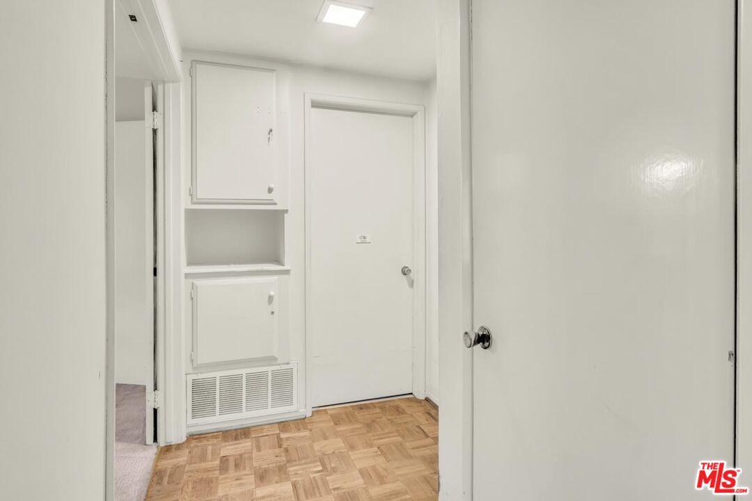 11258 Yolanda Avenue Porter Ranch, CA 91326 - Photo 30 of 46 a view of a hallway with closet and bathroom