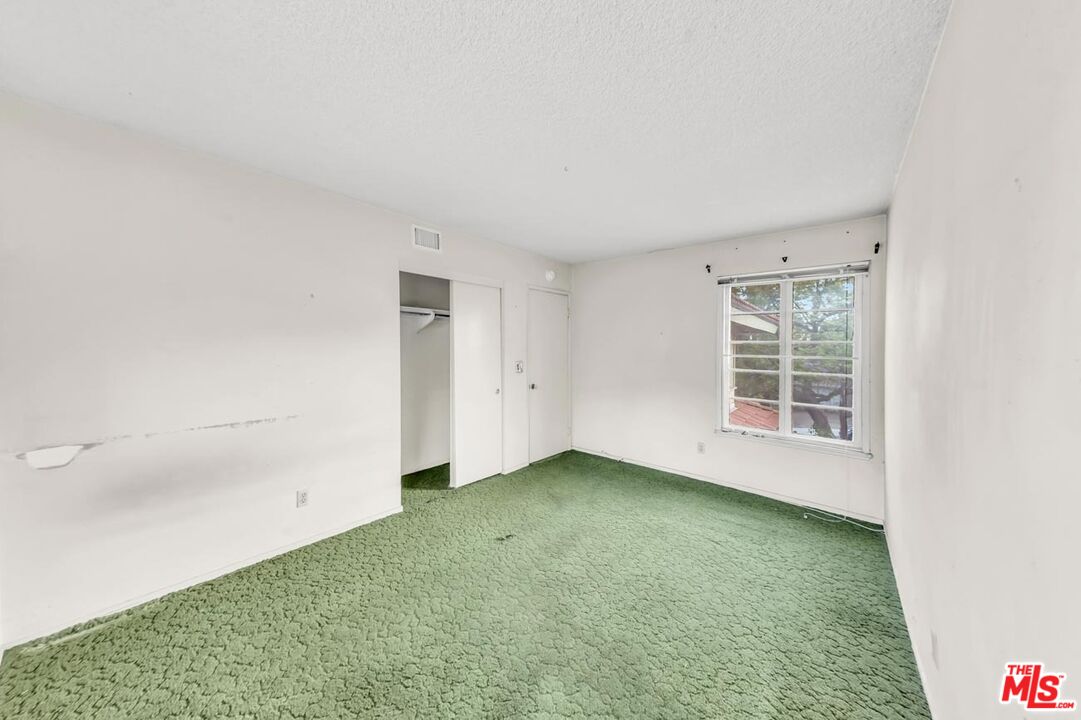 11258 Yolanda Avenue Porter Ranch, CA 91326 - Photo 35 of 46 an empty room with a window