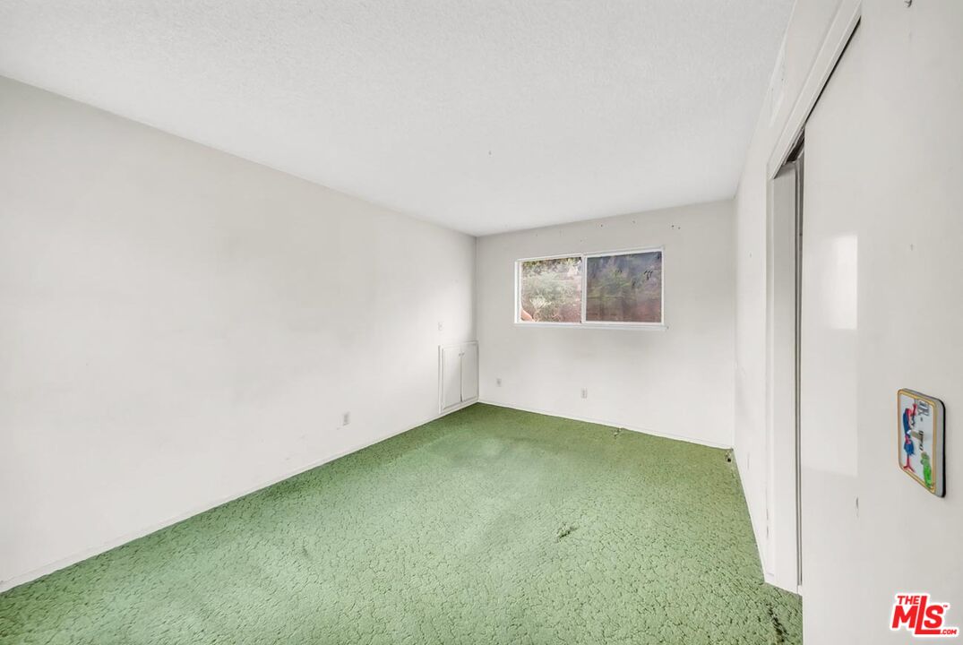 11258 Yolanda Avenue Porter Ranch, CA 91326 - Photo 36 of 46 a view of an empty room with a window