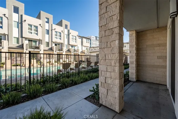 a view of hallway with wooden floor