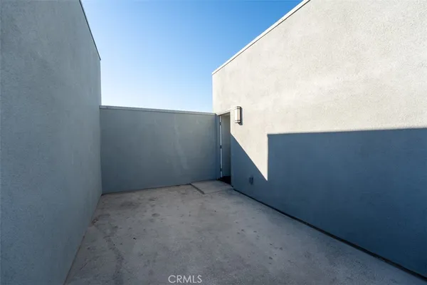 a view of an empty room with a sink