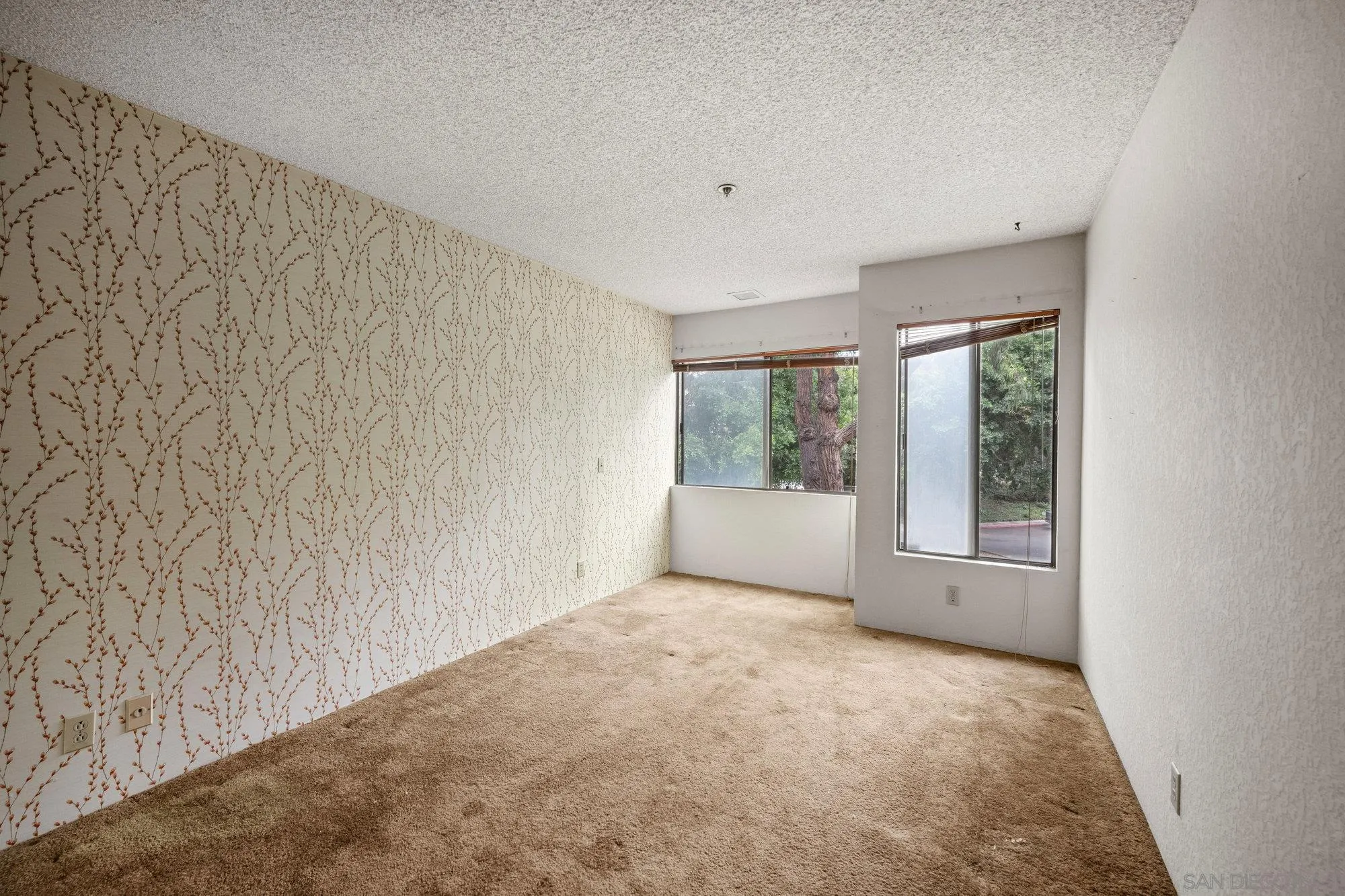 5665 Friars Road, Unit 232 San Diego, CA 92110 - Photo 25 of 30 a view of an empty room with a window