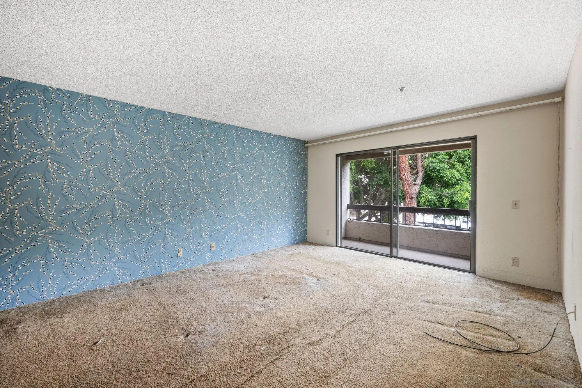 5665 Friars Road, Unit 232 San Diego, CA 92110 - Photo 26 of 30 a view of an empty room with a window