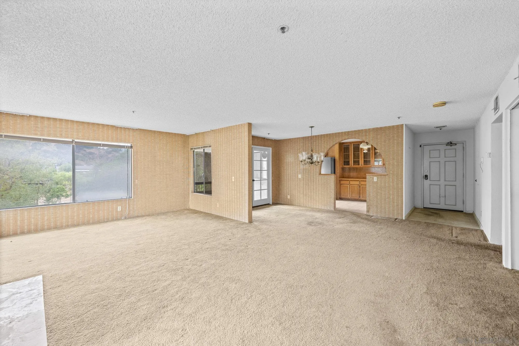 5665 Friars Road, Unit 232 San Diego, CA 92110 - Photo 10 of 30 a view of an empty room with a window