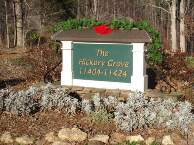 11406 Hickory Grove Church Road, Unit 22 Raleigh, NC 27613 - Photo 1 of 4 a sign that is on the side of the road