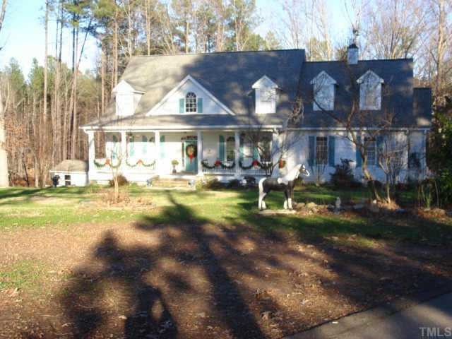 11406 Hickory Grove Church Road, Unit 22 Raleigh, NC 27613 - Photo 3 of 4 a front view of house with yard