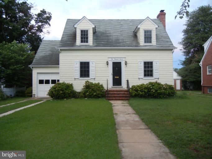 111 Homewood Road Linthicum Heights, MD 21090 - Photo 14 of 14 a front view of a house with a yard