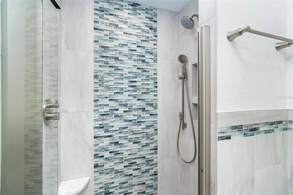 2700 North Beach Road, Unit A201 Englewood, FL 34223 - Photo 14 of 55 a bathroom with a shower