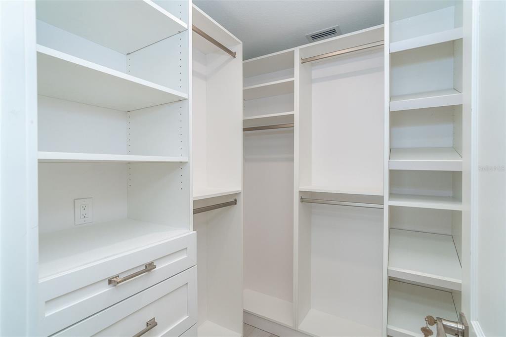 2700 North Beach Road, Unit A201 Englewood, FL 34223 - Photo 32 of 55 a close view of closet