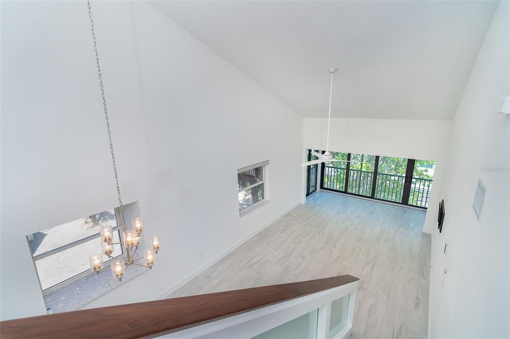 2700 North Beach Road, Unit A201 Englewood, FL 34223 - Photo 35 of 55 a view of dining room with furniture and chandelier