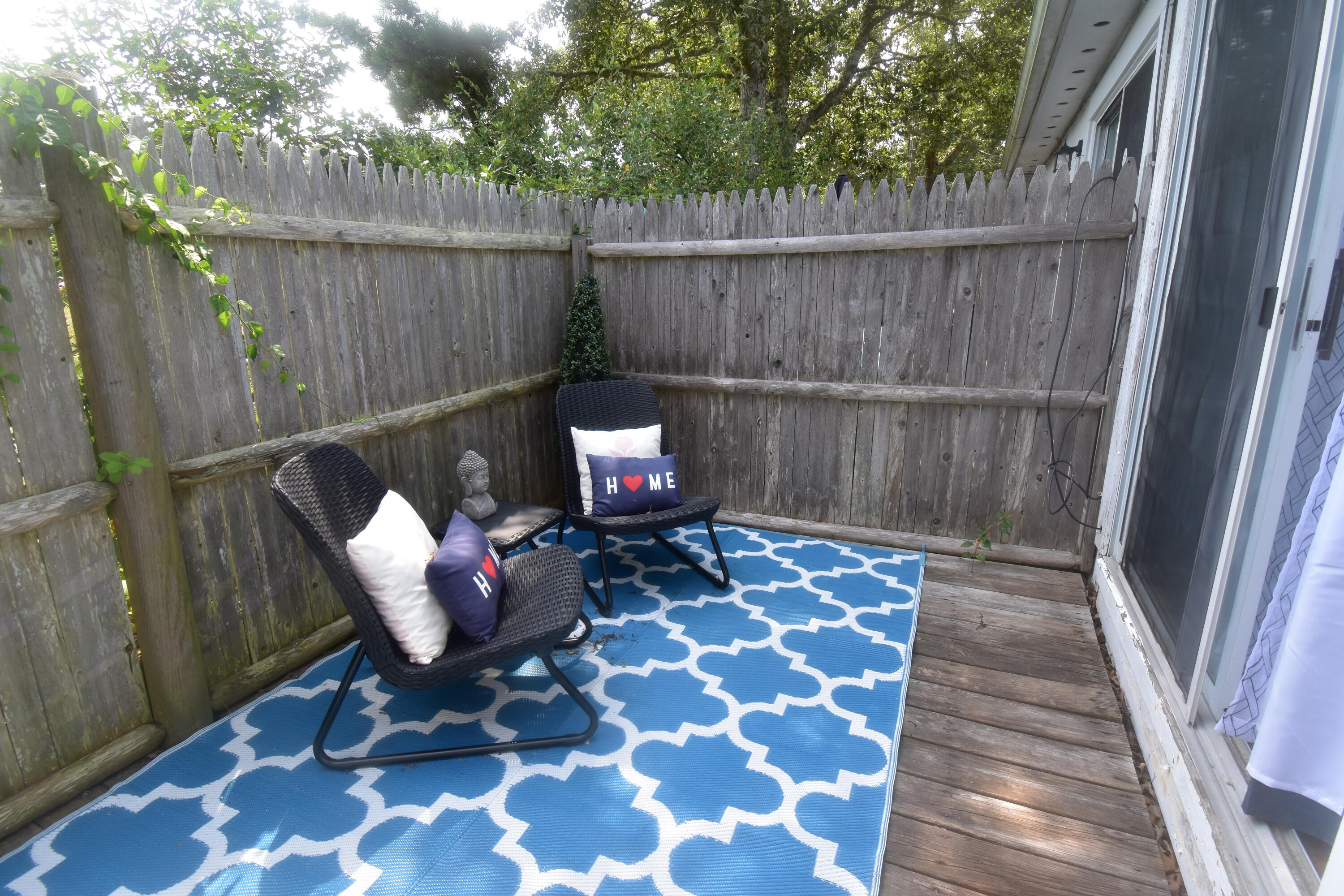 465 Lower County Road, Unit 10B Dennis Port, MA 02639 - Photo 6 of 29 a outdoor living space with furniture