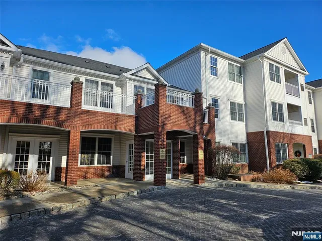 a front view of a house and a yard