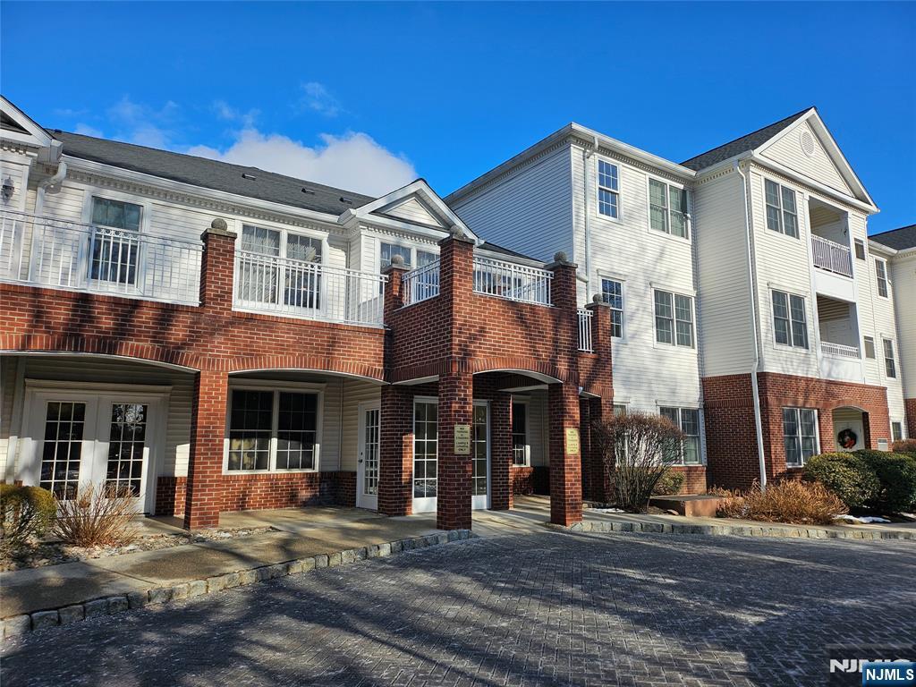 a front view of a house and a yard