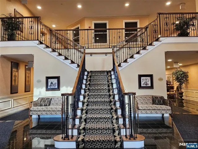 a view of entryway livingroom and hall