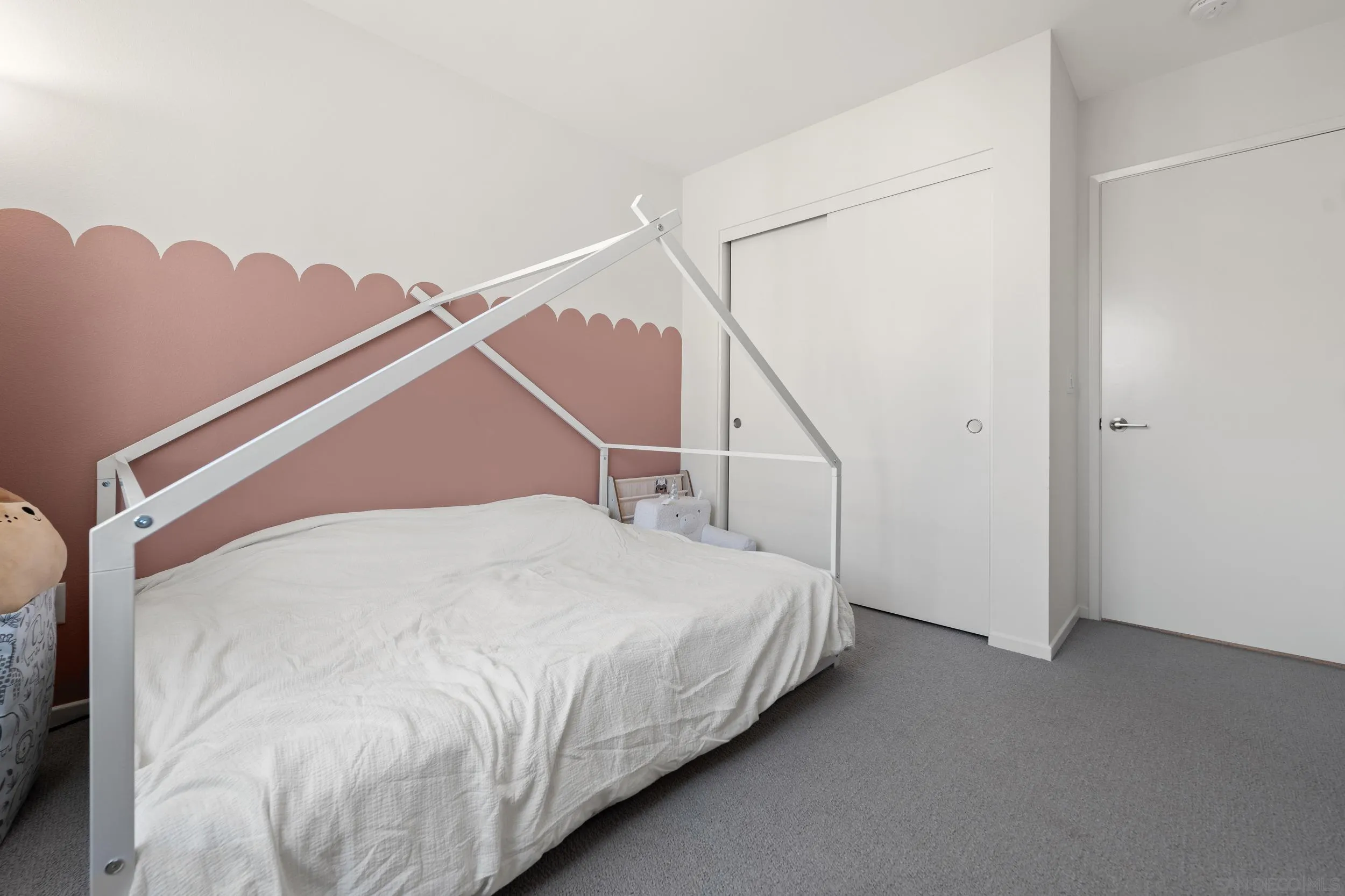 232 Perennial Place Fallbrook, CA 92028 - Photo 24 of 49 a bed sitting in a bedroom next to a window