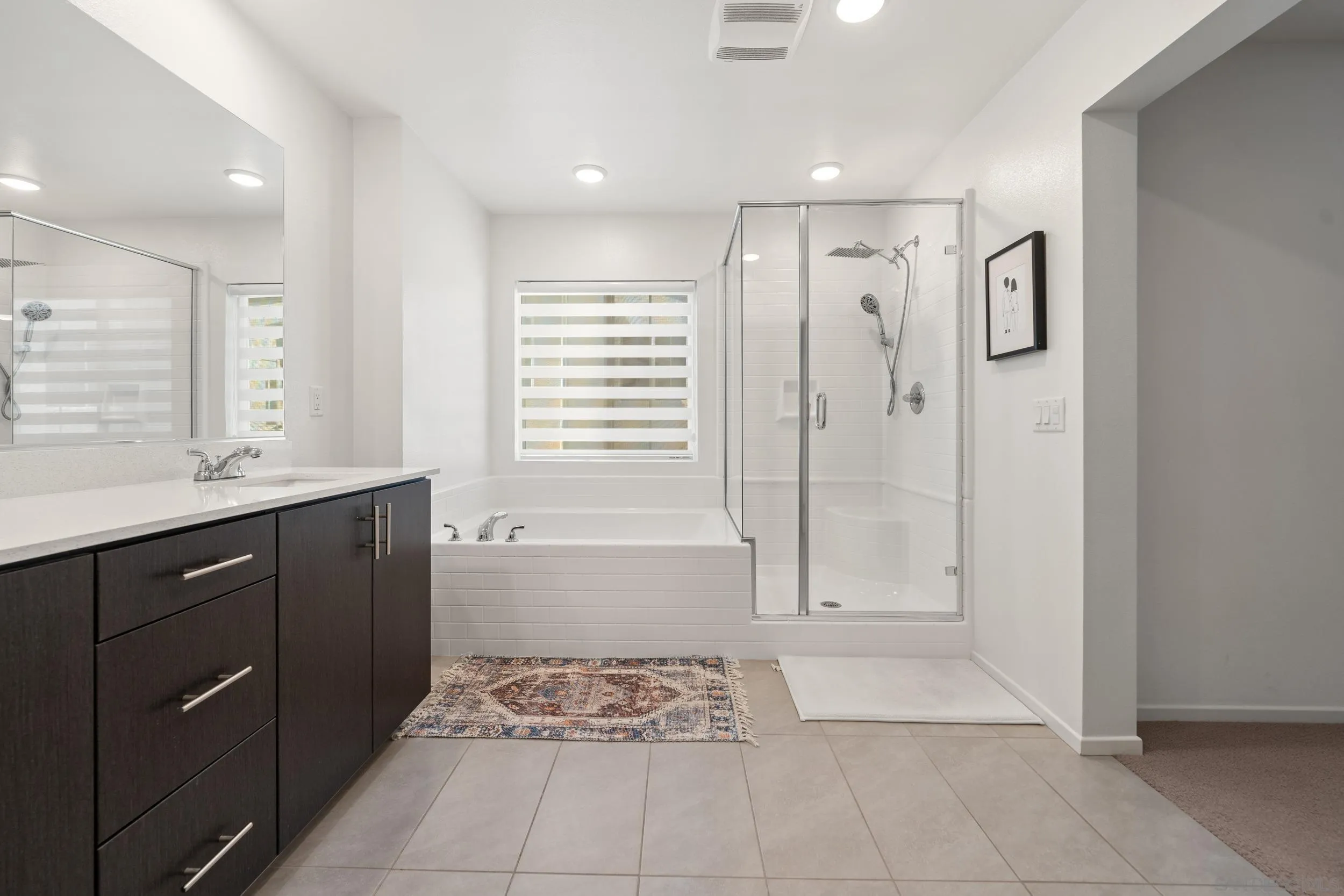 232 Perennial Place Fallbrook, CA 92028 - Photo 31 of 49 a bathroom with a shower sink and mirror
