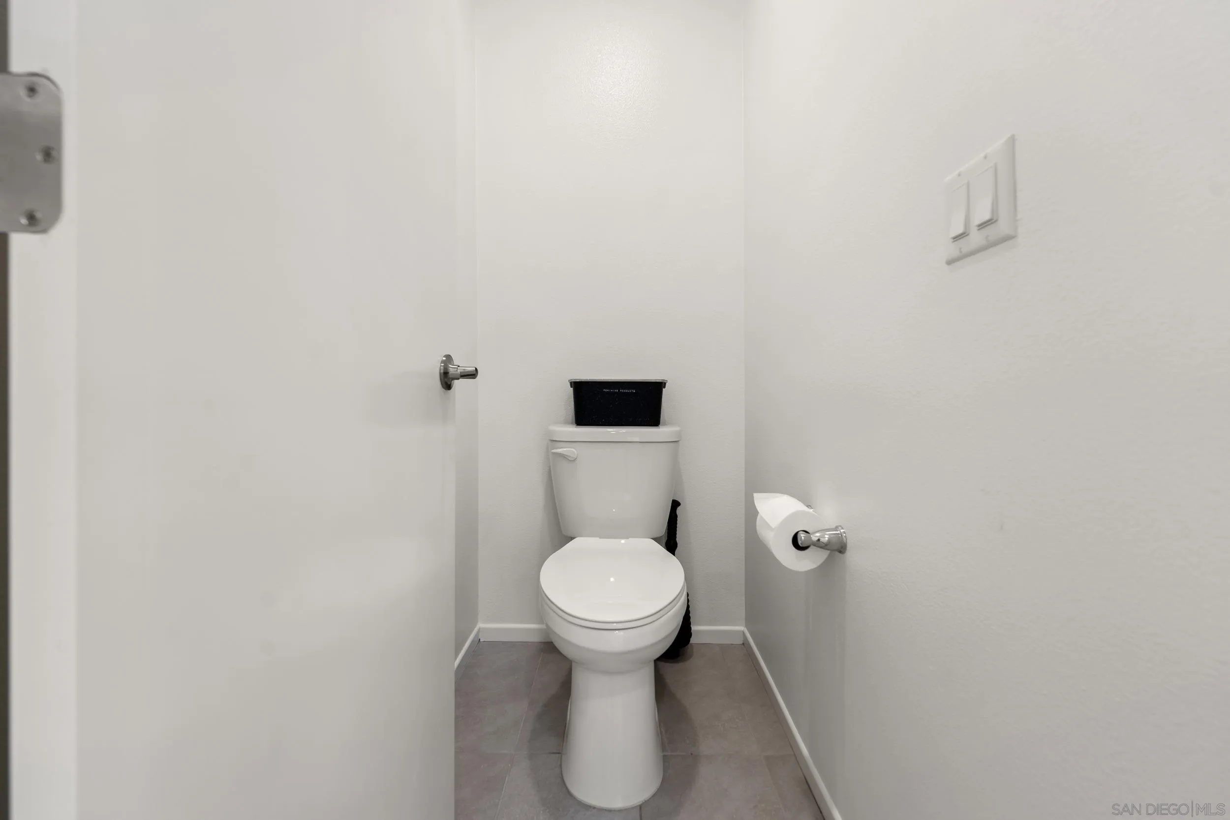 232 Perennial Place Fallbrook, CA 92028 - Photo 33 of 49 a white toilet sitting in a bathroom and a bathroom