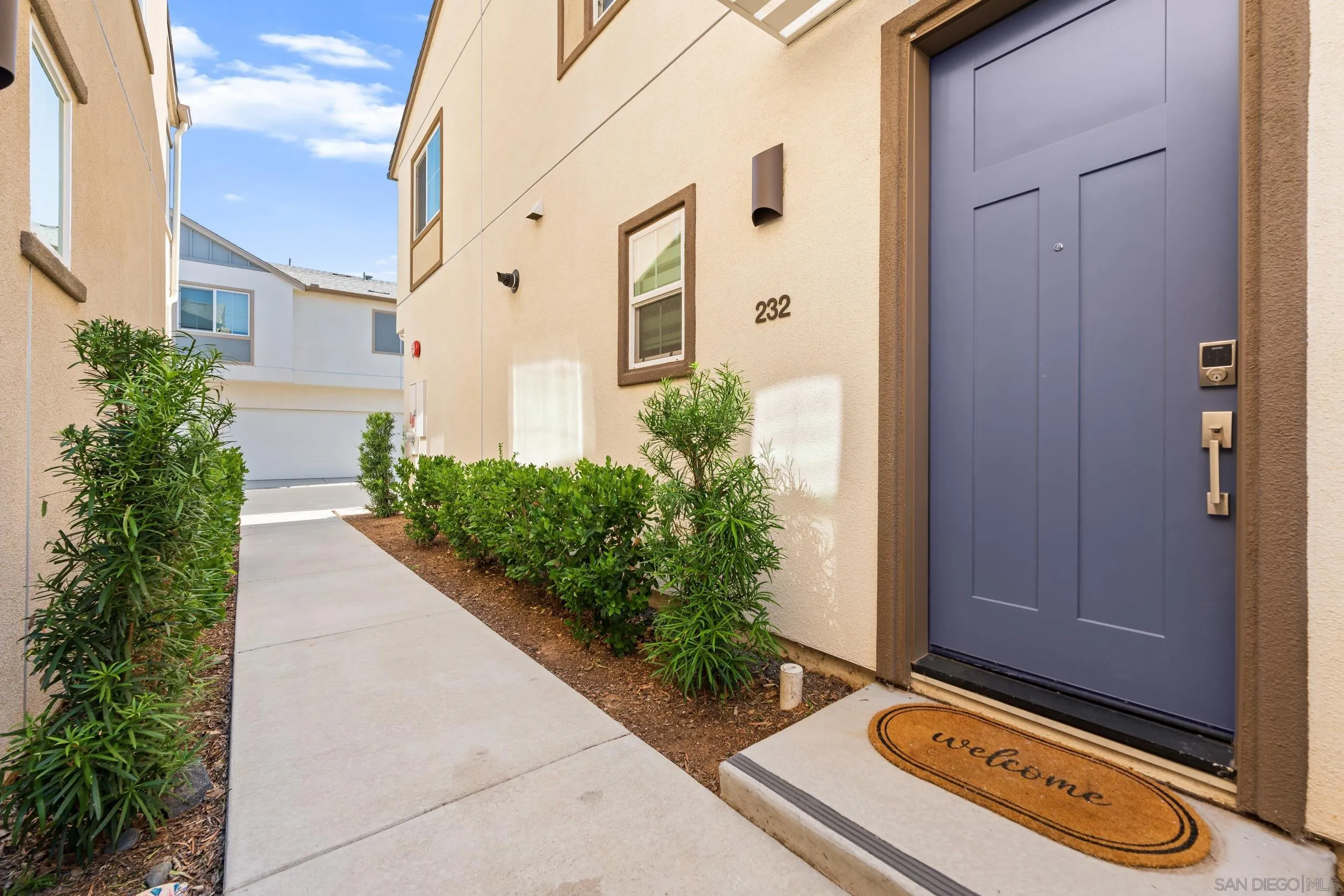 232 Perennial Place Fallbrook, CA 92028 - Photo 39 of 49 a front view of a house with a garden