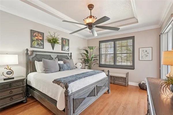 a spacious bathroom with a granite countertop sink mirror and a shower
