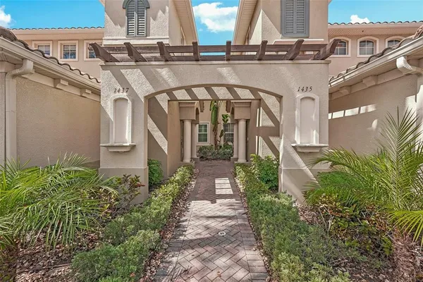a view of staircase with wooden door