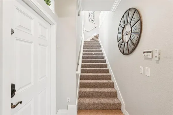 a bathroom with a shower and a mirror