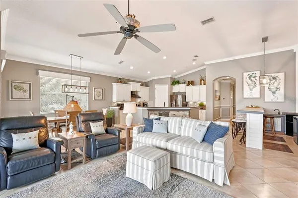 a view of a dining room with furniture window and outside view