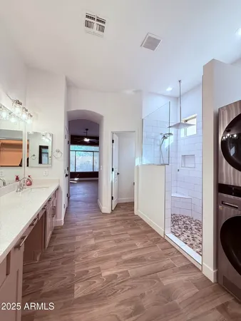 a view of a kitchen cabinets and wooden floor