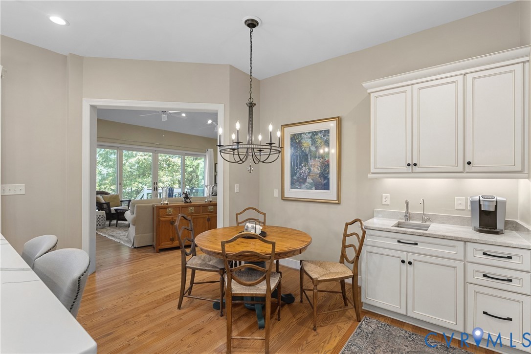 447 Tranquility Road Reedville, VA 22539 - Photo 31 of 82 Hardwood flooring throughout, white cabinetry with